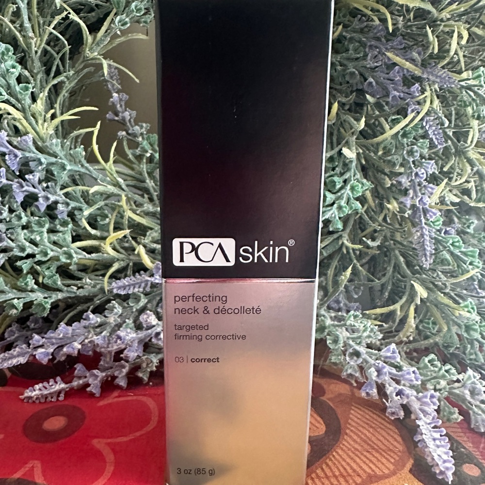 Perfecting Neck & Décolleté Cream - Black and Cream. Brand New